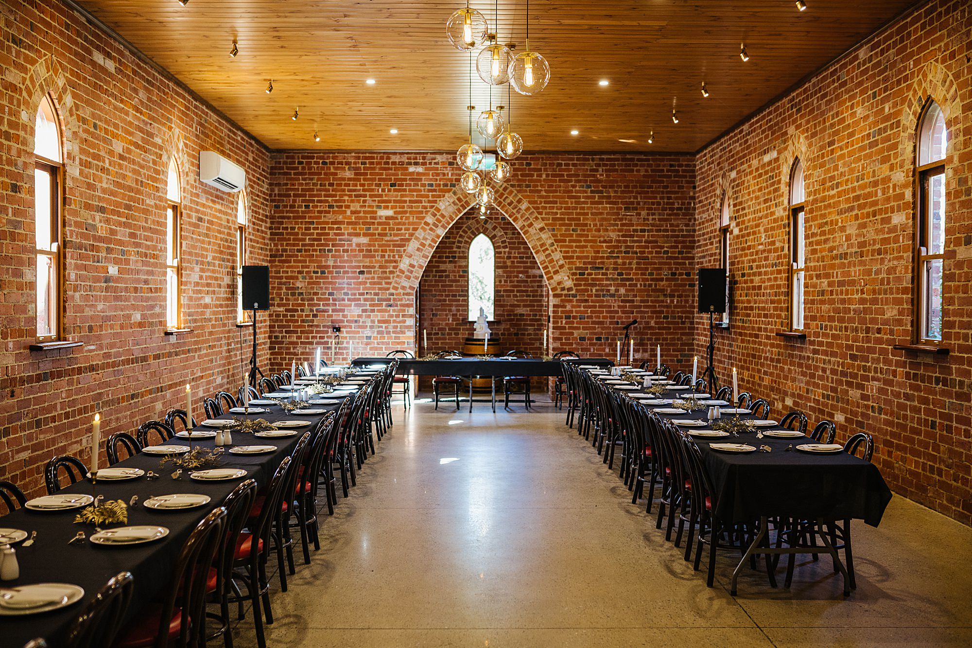 Banquet hall with seated placements at the Waratah Wedding Venue. 