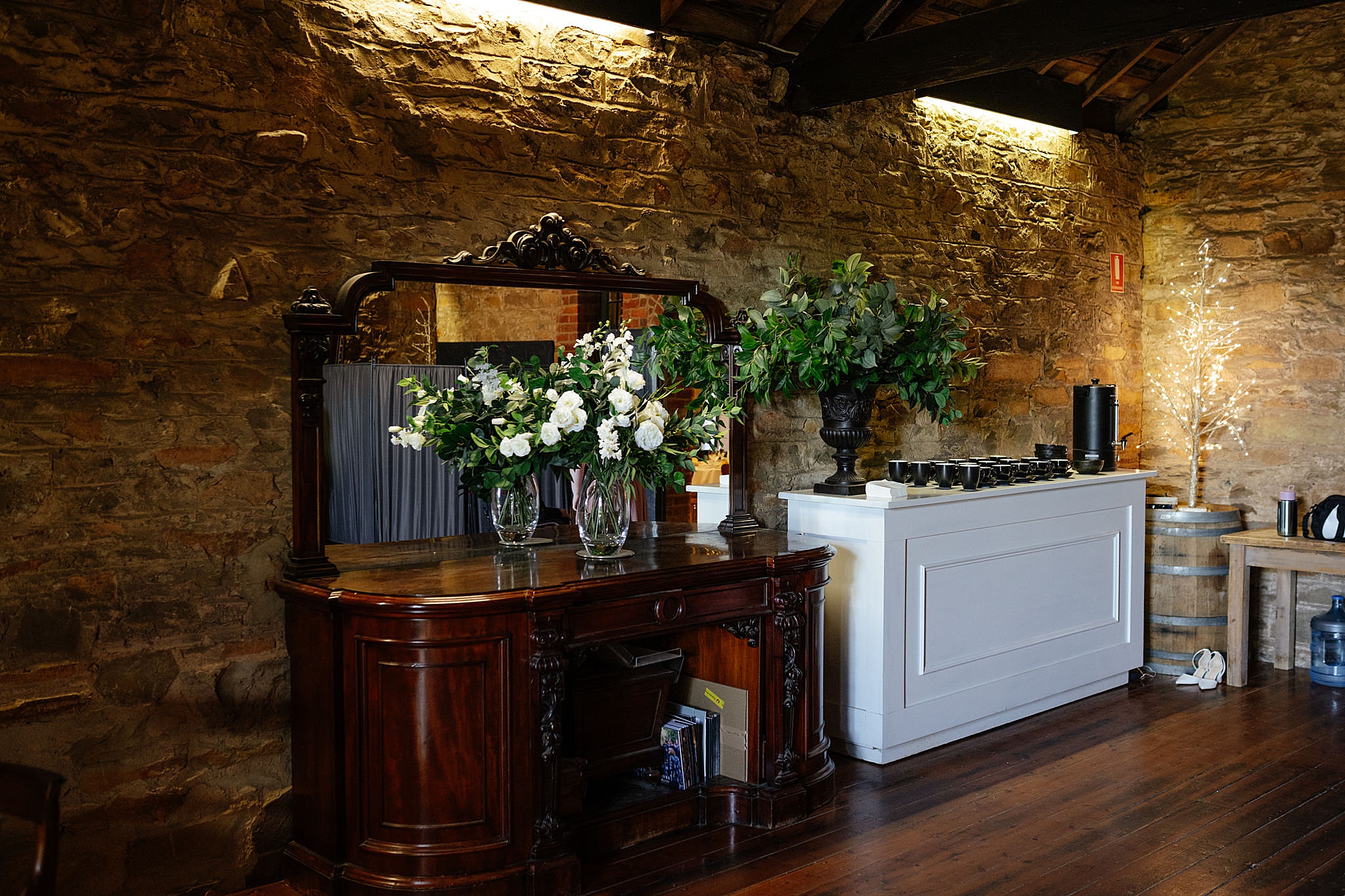 Sandstone chapel room with moody lighting
