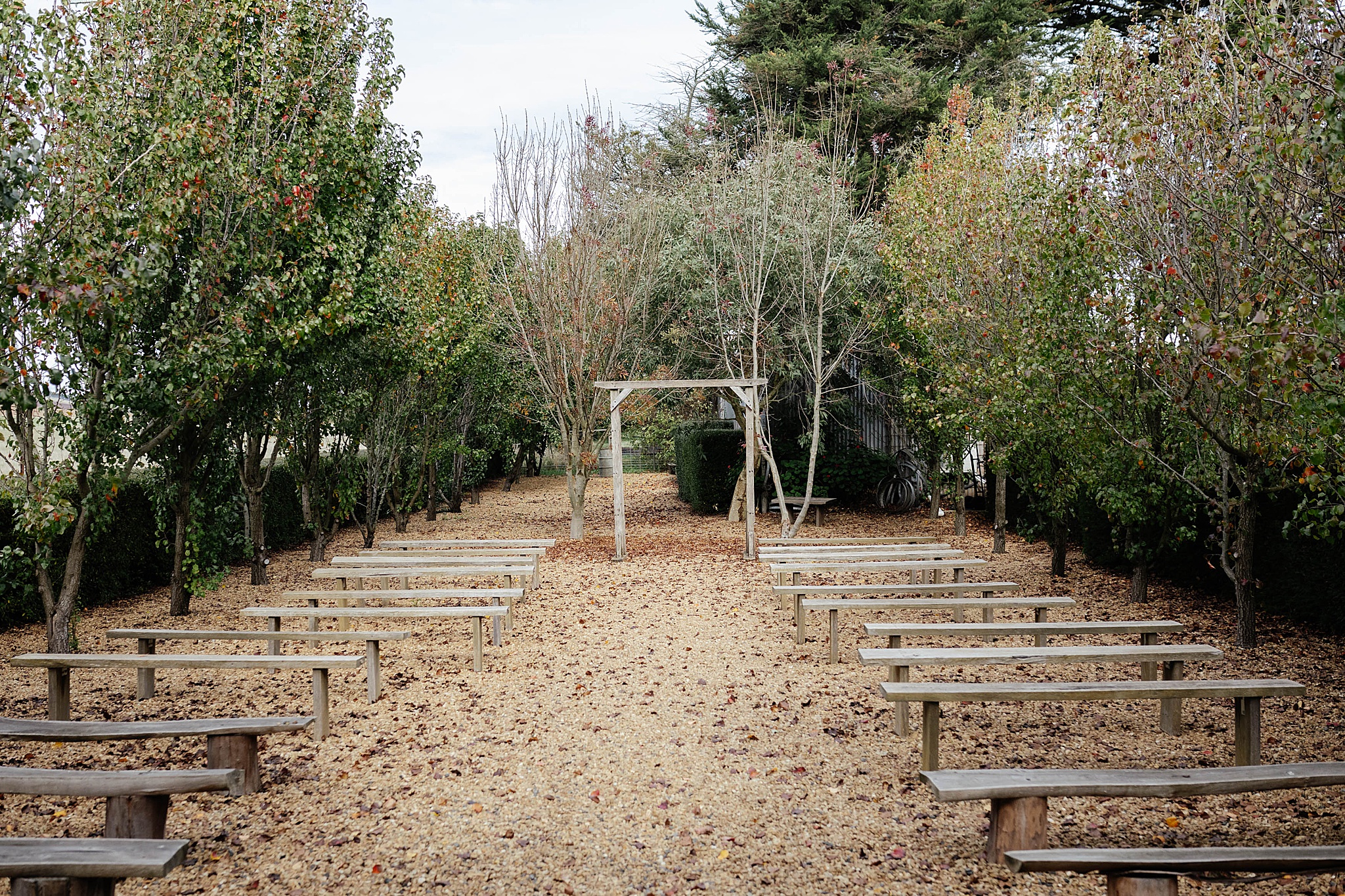 Outdoor ceremony area at stables wedding venue.